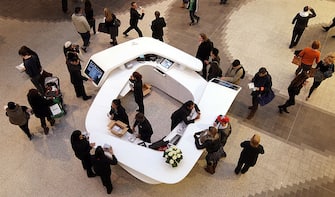 LONDON - NOVEMBER 03:  A general view of shoppers around one of the information help points at the newly opened Westfield shopping centre on November 3, 2008 in the west London, England.  Despite the current economic downturn in the retail industry, Europe's largest urban shopping mall, which opened to the public this week, is expected to attract 25 million shoppers each year to its 265 shops.  (Photo by Oli Scarff/Getty Images)