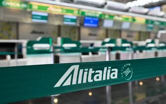 A general view shows deserted Alitalia check-in counters at the Terminal T1 of Rome's Fiumicino international airport on March 17, 2020. - Rome's second airport, Ciampino, has been closed, while Fiumicino is to close the T1, one of its three terminals from March 17. (Photo by ANDREAS SOLARO / AFP) (Photo by ANDREAS SOLARO/AFP via Getty Images)