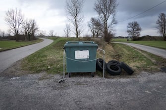 This picture taken on January 23, 2018 shows a trash bin on the side of a road in Vieillevigne.  / AFP PHOTO / ERIC CABANIS        (Photo credit should read ERIC CABANIS/AFP via Getty Images)