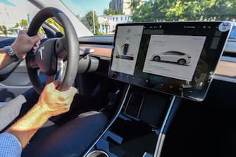 A picture taken on September 5, 2020 shows an inside view of a "Tesla Model Y" car, an all-electric compact SUV by US electric car giant Tesla, during its presentation at the Automobile Club in Budapest. (Photo by ATTILA KISBENEDEK / AFP) (Photo by ATTILA KISBENEDEK/AFP via Getty Images)