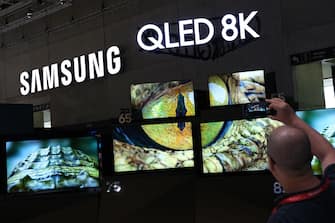 BERLIN, GERMANY - SEPTEMBER 05: Visitors have a look at new Samsung QLED 8K televisions at the 2019 IFA home electronics and appliances trade fair on September 05, 2019 in Berlin, Germany. The 2019 IFA fair will be open to the public from September 6-11. (Photo by Sean Gallup/Getty Images)