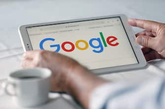 PARIS, FRANCE - SEPTEMBER 10: In this photo illustration, the Google logo is displayed on the screen of a tablet on September 10, 2019 in Paris, France. Yesterday in Washington, DC, fifty state attorneys general are joining together announced the launch of an antitrust investigation against the Google company, accused of dominating all aspects of advertising and Internet search. (Photo by Chesnot/Getty Images)