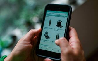 1228795949 A woman uses an e-commerce platform, in Mexico City, on September 29, 2020, amid the COVID-19 coronavirus pandemic. - Forced by a semester-long lockdown, millions of Latin Americans forgot their doubts and fears to buy necessary or leisure goods online, making e-commerce the big winner in this COVID-19 pandemic. (Photo by PEDRO PARDO / AFP) (Photo by PEDRO PARDO/AFP via Getty Images)