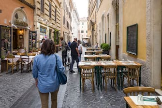 ROME, ITALY - JUNE 07: A street in the center of Rome with empty tables of restaurants in the street on June 07, 2020 in Rome, Italy. Many Italian businesses have been allowed to reopen, after more than two months of a nationwide lockdown meant to curb the spread of Covid-19. (Photo by Fabrizio Villa/Getty Images)