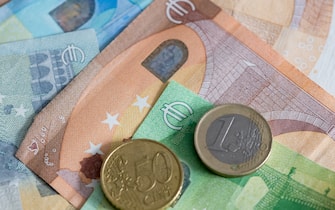 DORTMUND, GERMANY - APRIL 03: (BILD ZEITUNG OUT) In this photo illustration Euro coins on a Euro banknote  are seen on April 03, 2020 in Dortmund, Germany. (Photo by Alex Gottschalk/DeFodi Images via Getty Images)