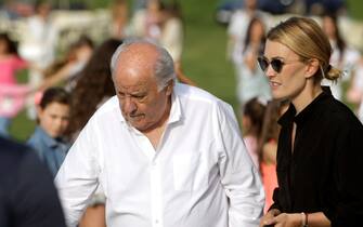 epa07727948 Inditex founder Amancio Ortega (C) and daughter Marta Ortega (R) attend the opening of the 38th International Jumping Competition in A Coruna, northwestern Spain, 19 July 2019. The competition will take place in summer at Casas Novas' hippodrome.  EPA/Cabalar