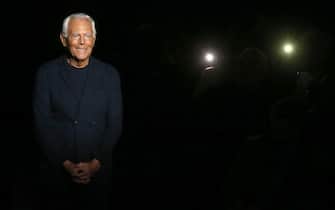 epa08125420 Italian fashion designer Giorgio Armani appears on the runway after the show by his label during the Milan Fashion Week Men's, in Milan, Italy, 13 January 2020. The Fall-Winter 2020/21 men's collections are presented at the Milano Moda Uomo from 10 to 14 January.  EPA/MATTEO BAZZI