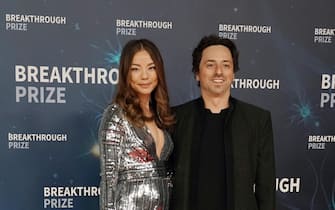 epa07971062 Sergey Brin, Breakthrough Prize Co-Founder and Co-Founder of Google (R) and his wife Nicole Shanahan (L) pose on the red carpet before the eighth annual Breakthrough Prize Awards, held at the NASA Ames Research Center in Mountain View, California, USA, 03 November 2019. The Breakthrough Prize is awarded annually, and recognizes the world's top scientists. Considered the world's most generous science prize, each Breakthrough Prize is three million US dollar and presented in the fields of Life Sciences (up to four per year), Fundamental Physics (one per year) and Mathematics (one per year).  EPA/MONICA M. DAVEY