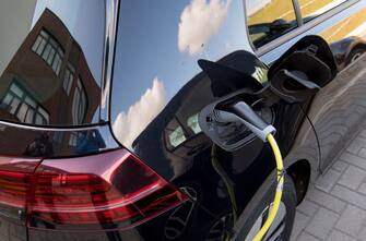 14 May 2019, Saxony, Zwickau: An E-Golf from VW is loading at a charging station in the Volkswagen Sachsen plant in Zwickau. Volkswagen is currently completely converting production at its plant in Saxony to the manufacture of electric vehicles. The first vehicles are scheduled to roll off the assembly line at the end of the year. Photo: Hendrik Schmidt/dpa-Zentralbild/ZB (Photo by Hendrik Schmidt/picture alliance via Getty Images)