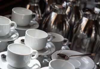 18 March 2019, Berlin: Empty porcelain cups and coffee pots standing on a table at the Federal Ministry of Economics and Labour Photo: Monika Skolimowska/dpa-Zentralbild/dpa (Photo by Monika Skolimowska/picture alliance via Getty Images)