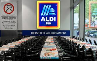 epa08391199 Shopping carts stand in line at a store of food retail chain Aldi Sued in Duesseldorf, Germany, 29 April 2020. In North Rhine-Westphalia, wearing of face masks has been mandatory for public transport, retail shops, medical practices and for trades and services since 27 April, if a distance of 1.5 meters cannot be maintained. Countries around the world are taking increased measures to stem the widespread of the SARS-CoV-2 coronavirus which causes the COVID-19 disease.  EPA/SASCHA STEINBACH