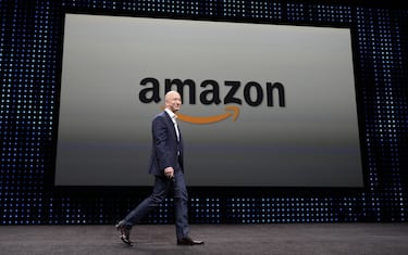 epa06996692 (FILE) - A file photograph showing Amazon CEO Jeff Bezos walking on stage at a press conference where he introduced new Kindle products such as the Kindle Paperwhite Wi-Fi + 3G, the Kindle Fire HD and new programs and innovations for the wireless tablets at Santa Monica Airport in Santa Monica, California, USA, 06 September 2012 (issued 04 September 2018). Amazon.com Inc. has become the second publicly traded US company to reach one trillion US dollars in market value. Last month Apple Inc. was the first company to be valued at 1 trillion US dollars.  EPA/MICHAEL NELSON