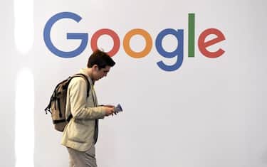A man walks past the logo of the US multinational technology company Google during the VivaTech trade fair ( Viva Technology), on May 24, 2018 in Paris. (Photo by ALAIN JOCARD / AFP)        (Photo credit should read ALAIN JOCARD/AFP via Getty Images)