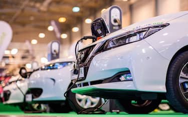 30 November 2018, North Rhine-Westphalia, Essen: Several Nissan Leaf electric cars are exhibited at the Tuning Fair Essen Motor Show. The fair will take place until 9.12.. Photo: Marcel Kusch/dpa