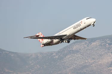 Volotea Airlines Boeing 717 aircraft taking off as seen departing from Athens International Airport ATH in front of the terminal and the control tower in the blue sky. The B717 airplane has the registration EI-FGI. Volotea V7 VOE is a Spanish low-cost airline with bases operating flight in Spain, Italy, France and Greece. The budget carrier has a fleet of 36 planes. The world passenger traffic declined during the coronavirus epidemic era with the industry struggling to survive. Athens, Greece on September 21, 2020 (Photo by Nicolas Economou/NurPhoto via Getty Images)
