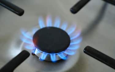 ZWOLLE, NETHERLANDS - OCTOBER 11: Blue and orange flames on a gas stove burner in a kitchen in Zwolle, Overijssel, The Netherlands on October 11. Energy prices are rising fast in The Netherlands, causing financial problems for households. (Photo by Sjoerd van der Wal/Getty Images)