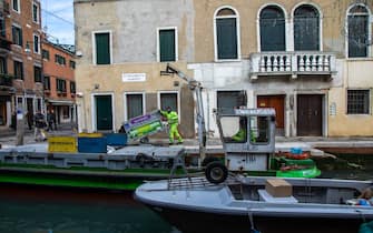 VENICE, ITALIA - FEBRUARY 24: Boat collecting garbage in the canal, Veneto, Venice, Italia on February 24, 2018 in Venice, Italia. (Photo by Eric Lafforgue/Art in All of Us/Corbis via Getty Images)