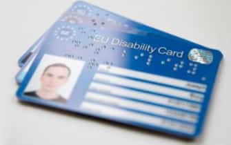 Un facsimile di una Disability Card