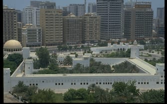 Urban panorama featuring Al-Hosn Palace, aka White Fort, Abu Dhabi's oldest (fore), w. mosque, modern office & apartment bldgs. looming beyond.    (Photo by Barry Iverson/Getty Images)