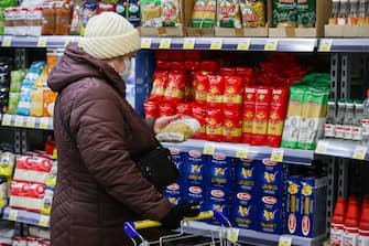 NOVOSIBIRSK, RUSSIA - MARCH 24, 2021: A customer shops at a 365+ grocery discounter of the Lenta retail chain. Kirill Kukhmar/TASS (Photo by Kirill Kukhmar\TASS via Getty Images)