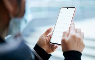 1216542875 calendar on smart phone