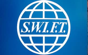 epa09788047 (FILE) - The SWIFT logo at their headquarters in Brussels, Belgium, 26 June 2006 (reissued 26 February 2022). Western allies agreed to exclude Russian banking institutions from the SWIFT bank transfer system, European Commission President von der Leyen said on 26 February 2022 as a fresh and more sever round of sanction against Russia's invasion of Ukraine. Russian troops entered Ukraine on 24 February prompting the country's president to declare martial law and triggering a series of announcements by Western countries to impose severe economic sanctions on Russia.  SWIFT is a member-owned cooperative that provides the communications platform, products and services to connect more than 10,000 financial institutions and corporations in 210 countries.  EPA/JACQUES COLLET *** Local Caption *** 50264052