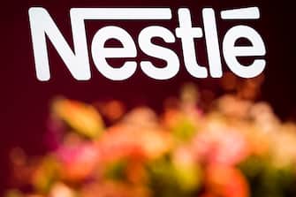 epa09018170 (FILE) - The Nestle logo is pictured during the general meeting of the world's biggest food and beverage company, Nestle Group, in Lausanne, Switzerland, 11 April 2019 (reissued 17 February 2021). Nestle is due to release its 2020 full-year results on 18 February 2021.  EPA/JEAN-CHRISTOPHE BOTT *** Local Caption *** 55118423