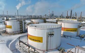SAMARA REGION, RUSSIA - FEBRUARY 24, 2022: An aerial view of an oil tank battery at the Novokuibyshevsk Refinery, a subsidiary of Rosneft Oil Company, in the city of Novokuibyshevsk 20 km southwest of Samara. The enterprise's primary distillation capacity is 8.8 million tons per year. The Novokuibyshevsk Refinery is one of the major manufacturers and suppliers of the superior grade of fuel for jet engines of the brand RT, the most in-demand type in Russia. Yegor Aleyev/TASS/Sipa USA