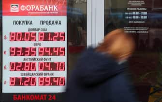 MOSCOW, RUSSIA - NOVEMBER 2, 2020: A digital board displaying currency exchange rates in a street. Us Dollar has risen over 80 rubles for the first time since March 2020; Euro has risen over 94 rubles for the first time since December 2014. Alexander Shcherbak/TASS/Sipa USA