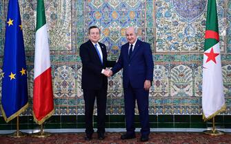 (220412) -- ALGIERS, April 12, 2022 (Xinhua) -- Algerian President Abdelmadjid Tebboune (R) meets with Italian Prime Minister Mario Draghi in Algiers, Algeria, April 11, 2022. Algeria will increase its gas exports to Italy as part of agreements signed between the two sides on Monday to strengthen their energy cooperation, said the Algerian presidency. (Algerian Presidency/Handout via Xinhua) - Algerian Presidency -//CHINENOUVELLE_XxjpbeE007131_20220412_PEPFN0A001/2204121324/Credit:CHINE NOUVELLE/SIPA/2204121329
