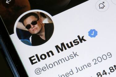 PARIS, FRANCE - APRIL 26: In this photo illustration, the Elon Muskâ  s Twitter account is displayed on the screen of an iPhone on April 26, 2022 in Paris, France. The U.S. multi-billionaire Elon Musk bought the social network Twitter on Monday April 25 for the sum of 44 billion dollars after two weeks of arm wrestling with the company's board of directors. (Photo illustration by Chesnot/Getty Images)