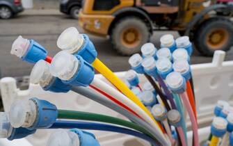 05 February 2021, Mecklenburg-Western Pomerania, Gützkow: Colourful empty pipes for fibre optic cables for high-speed internet can be seen at a construction site for broadband internet expansion in Gützkow in the district of Vorpommern-Greifswald.The fibre optic network enables internet connections with download rates of up to 200 Mbit/s and upload rates of up to 100 Mbit/s. Photo: Stefan Sauer/dpa-Zentralbild/ZB (Photo by Stefan Sauer/picture alliance via Getty Images)