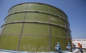 A gas storage tank stands the construction site of the Trans Adriatic Pipeline receiving terminal in Melendugno, Italy, on Tuesday, May 22, 2018. The Trans-Adriatic Pipeline, known as TAP, is a a 4.5 billion-euro ($5.2 billion) natural gas pipeline that will bring gas from Azerbaijan, winding through Greece and Albania, under the Adriatic Sea and finally up into Italy, which imports more than 90 percent of its oil and gas. Photographer: Giulio Napolitano/Bloomberg