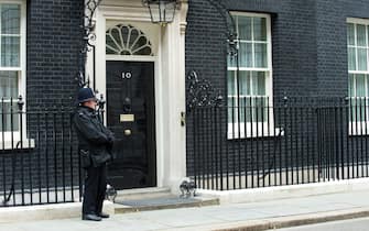 10 Downing Street with London Bobby policeman standing guard