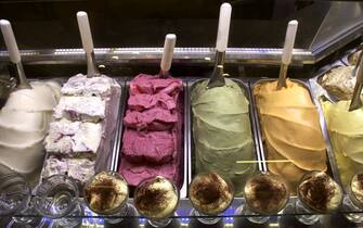 FLORENCE, ITALY - NOVEMBER 9, 2015: A colorful selection of gelato flavors, entices customers in a gelato, or ice cream, shop in Florence, Italy. (Photo by Robert Alexander/Getty Images)