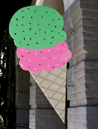  JACKSONVILLE, OREGON - JUNE 19, 2019: A sign in the shape of an ice cream cone is mounted at the entrance to an ice cream shop in Jacksonville, Oregon, near Medford. (Photo by Robert Alexander/Getty Images)