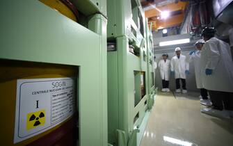 862844620 A picture shows nuclear waste inside a storage room of the Garigliano Nuclear Power Plant located at the outskirts of Sessa Aurunca, 160km southern Rome, on October 17, 2017. The French Institut of Radioprotection and Nuclear Safety Institute (IRSN) and the Italian counterpart ISPRA organized today a press tour to the Garigliano Nuclear Power Plant which is being dismantled.
Italy operated a total of four nuclear power plants starting in the early 1960s but decided to phase out nuclear power in a referendum that followed the 1986 Chernobyl accident. It closed its last two operating plants, Caorso and Trino Vercellese, in 1990. Plans for waste management include the development of a national repository for the disposal of low - and intermediate- level waste and interim storage of high-level waste. State-owned Societa Gestione Impianti Nucleari SpA (Sogin) was established in 1999 to take responsibility for decommissioning Italy's former nuclear power sites and locating a national waste store. / AFP PHOTO / FILIPPO MONTEFORTE (Photo credit should read FILIPPO MONTEFORTE/AFP via Getty Images)