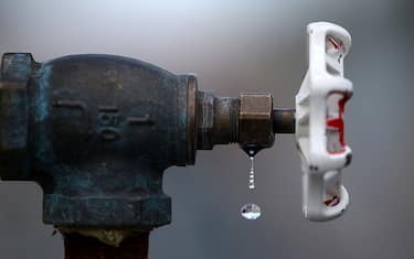 PLEASANTON, CA - APRIL 08:  Water drips from a faucet at the Dublin San Ramon Services District (DSRSD) residential recycled water fill station on April 8, 2015 in Pleasanton, California.  As California enters its fourth year of severe drought, the DSRSD is allowing residents to pick up free recycled water to be used to water trees, gardens, and lawns. Residents can California residents are facing a mandatory 25 percent reduction in water use.  (Photo by Justin Sullivan/Getty Images)