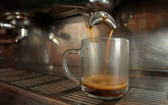 SEATTLE, WA - SEPTEMBER 2:  A double shot of espresso drips into a cup at the B&O Espresso Cafe September 2, 2003 in Seattle, Washington. Seattle has a dime-a-cup espresso-tax initiative on the ballot for a September 16 election that would fund preschool and day-care programs. (Photo by Ron Wurzer/Getty Images) 