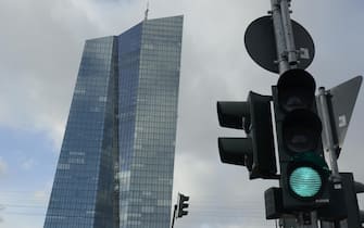 epa07223573 (FILE) - A view of a green traffic light in front of the European Central Bank, ECB, in Frankfurt, 12 December 2017 (reissued 11 December 2018). The Court of Justice of the European Union (CJEU) issued a press release 11 December 2018 saying 'The PSPP (public sector purchase programme) does not exceed the ECB's mandate'. German plaintiffs had brought the European Central Bank's policy called 'quantitative easing' (QE) bond-buying programme before court, saying the bank had exceeded its mandate in 2015 when it started to purchase European government bonds to quell the risk of deflation.  EPA/MAURITZ ANTIN