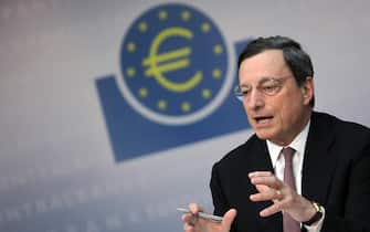 epa03296544 President of the European Central Bank (ECB), Mario Draghi speaks at an ECB press conference in Frankfurt Main, Germany, 05 July 2012. The European Central Bank (ECB) did not discuss extra measures such as bying government bonds or offering more cheap loans to banks at a meeting in which it lowered eurozone interest rates to 0.75 per cent, its president said 05 July.  EPA/FREDRIK VON ERICHSEN
