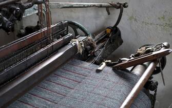 Harris tweed fabric woven on a Hattersley loom at the home of Donald MacDonald, Shawbost village, Isle of Lewis, Outer Hebrides, Scotland on 19 July 2018. Harris Tweed must be made from pure virgin wool which has been dyed and spun on the islands and handwoven at the home of the weaver in the Outer Hebrides of Scotland. (photo by Tessa Bunney/In Pictures via Getty Images)