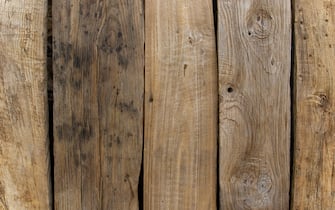 Full frame shot of  some heavily textured wooden planks. Horizontal composition with lot of copy space.
