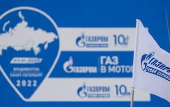 VLADIVOSTOK, RUSSIA - AUGUST 2, 2022: A Gazprom flag is seen during a ceremony marking the start of the 2022 Gas-Into-Motors international rally, at Gazprom's logistics centre for the maintenance of cryogenic liquid containers. The motor rally, which hosts natural gas powered vehicles and covers a distance of 10,000 km across 25 regions of Russia, is scheduled to finish on 15 September in St Petersburg as part of the 11th St Petersburg International Gas Forum (SPIFG 2022). Yuri Smityuk/TASS/Sipa USA