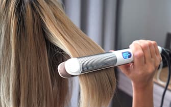 Hair iron straightening beauty care salon spa.