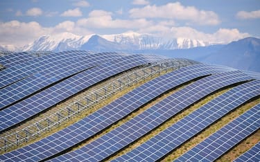 A general view shows the photovoltaic solar pannels at the power plant in La Colle des Mees, Alpes de Haute Provence, southeastern France, on April 17, 2019. - The 112,000 solar panels cover an area of 200 hectares with a total capacity of 100MW. (Photo by GERARD JULIEN / AFP)        (Photo credit should read GERARD JULIEN/AFP via Getty Images)