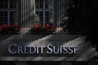 A photograph taken on August 15, 2022 shows a sign of Swiss banking giant Credit Suisse in Bern. - Switzerland's scandal-hit banking giant Credit Suisse last month appointed a new chief executive as higher litigation costs, financial market volatility and rising interest rates worldwide pushed it deeper into the red in the second quarter. (Photo by Fabrice COFFRINI / AFP) (Photo by FABRICE COFFRINI/AFP via Getty Images)