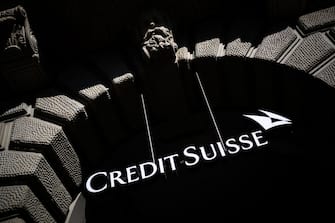 This illustration photo shows a sign with the logo of Switzerland's second largest bank "Credit Suisse" at their headquarters in Zurich on March 23, 2022. (Photo by Fabrice COFFRINI / AFP) (Photo by FABRICE COFFRINI/AFP via Getty Images)