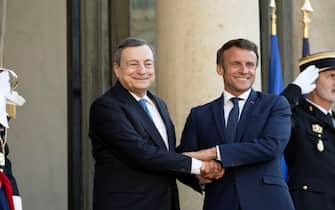 French President Emmanuel Macron welcomes Italian Prime Minister Mario Draghi ahead of a meeting and working dinner at the Elysee Palace in Paris on June 8, 2022. Photo by Eliot Blondet / ABACAPRESS.COM