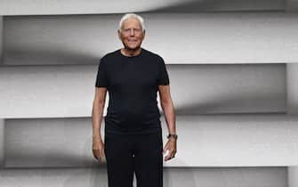 Italian fashion designer Giorgio Armani appears on the catwalk after the presentation of his Emporio Armani Spring/Summer 2023 menswear collection during the Milan Men's Fashion Week, in Milan, Italy, 18 June 2022. The Milano Moda Uomo displays Spring/Summer 2023 collections and runs from 17 to 21 June. ANSA/DANIEL DAL ZENNARO